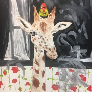 Giraffe with bird